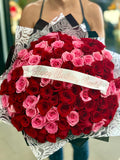 Ramo Buchon elegant wrapped rose bouquet from Fantasy Flowers and Balloons